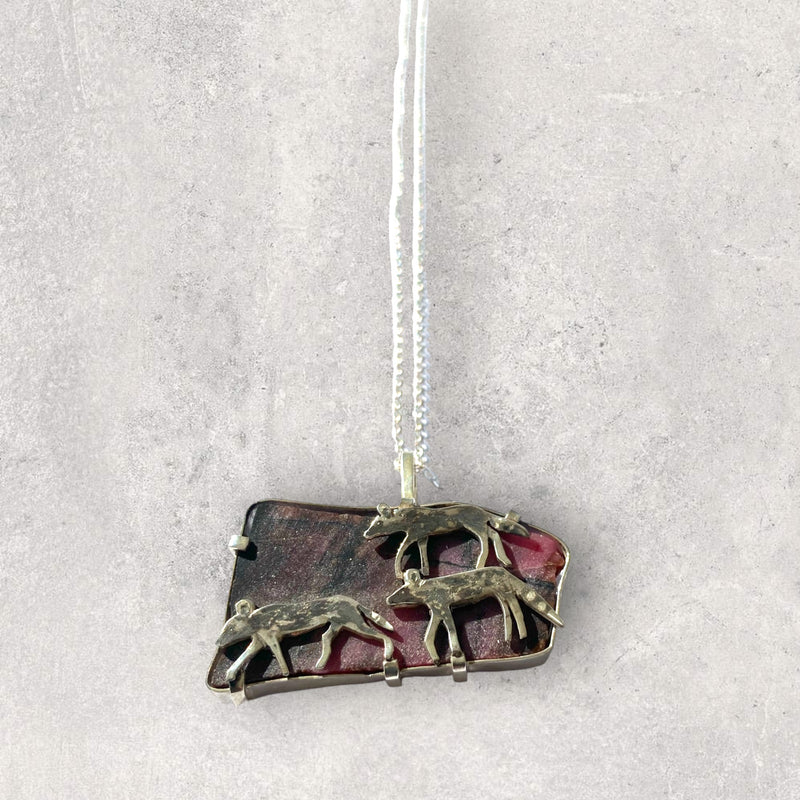 Wild Dogs on Rhodolite Pendant